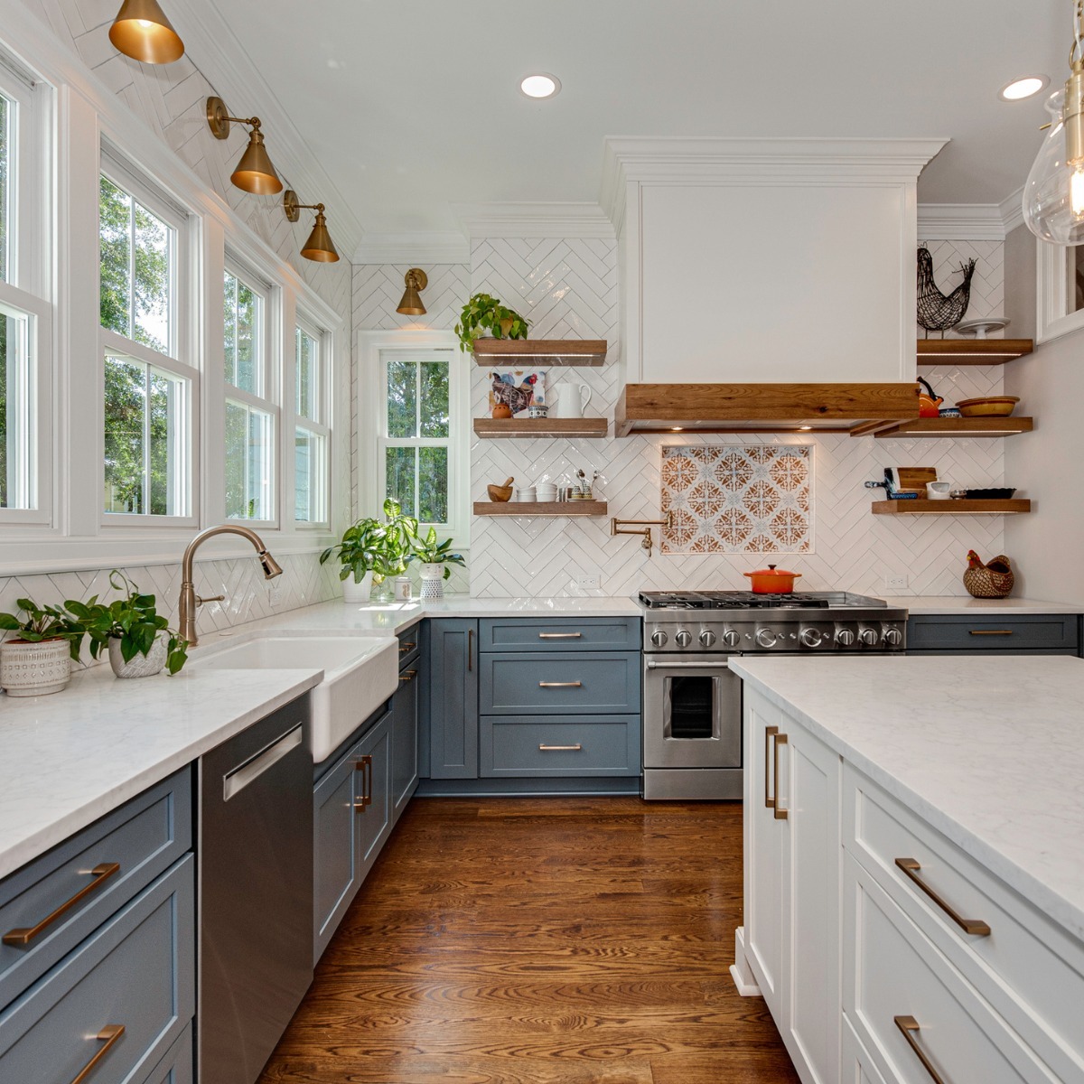 Open concept kitchen and living room remodel with white cabinetry, large island, and coffered ceiling